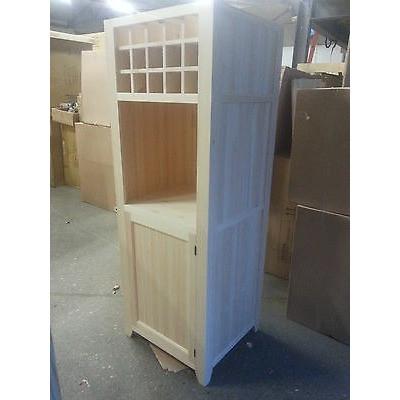 Free standing oven housing unit with cupboard and wine rack