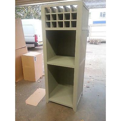 Free standing oven housing unit with cupboard and wine rack